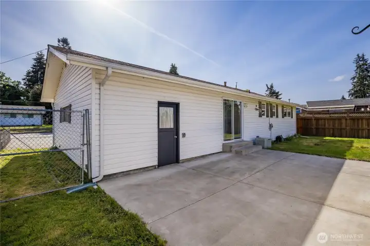 Expansive patio with direct access to garage or dining area