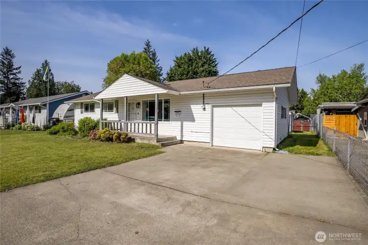 Extra-wide driveway offers convenient off-street parking