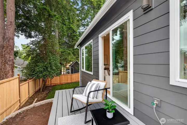 Enjoy indoor-outdoor living with a large deck and private backyard.