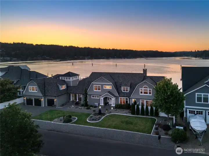 Gracing the pristine shores of Miller Bay, this exceptional waterfront estate offers the ultimate Pacific Northwest lifestyle.