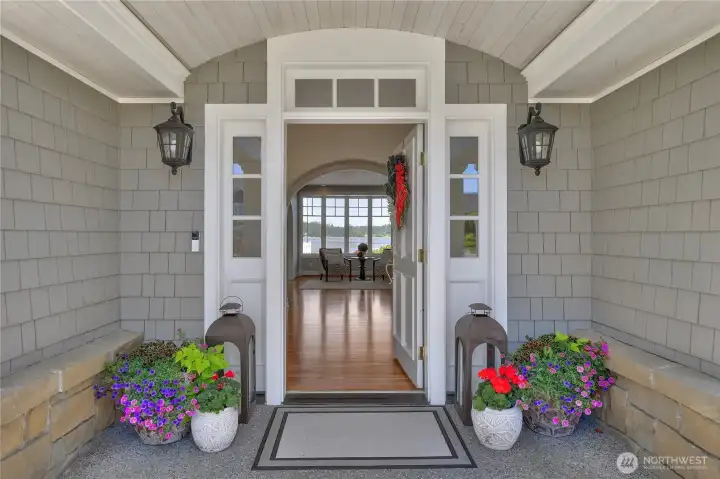 Thoughtfully designed for both grand entertaining and everyday comfort, the residence offers more than 6,600 square feet of living space, with expansive waterfront-facing rooms that showcase ever-changing views of Miller Bay.