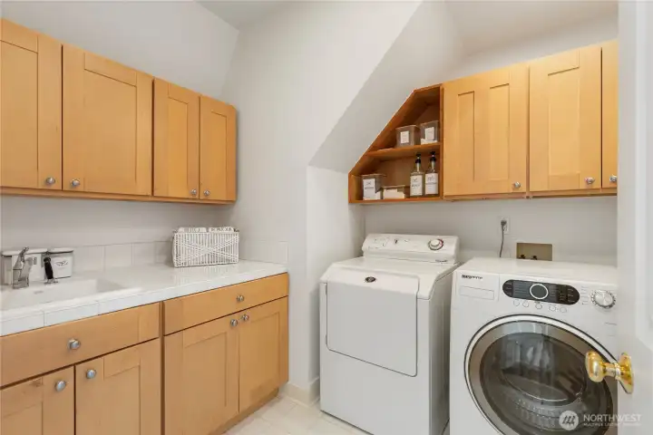 Upstairs laundry room.