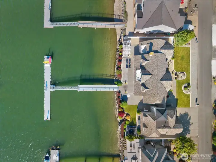 Modern comforts complement the home's timeless appeal, including energy-efficient ductless heat pumps, in-floor radiant heating, and generator-ready infrastructure for year-round peace of mind.