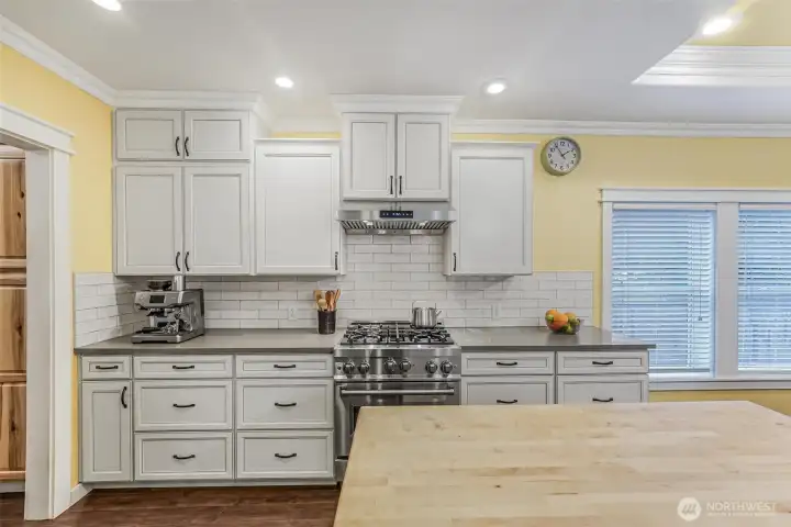 Gas cooking, plenty of custom cabinets.