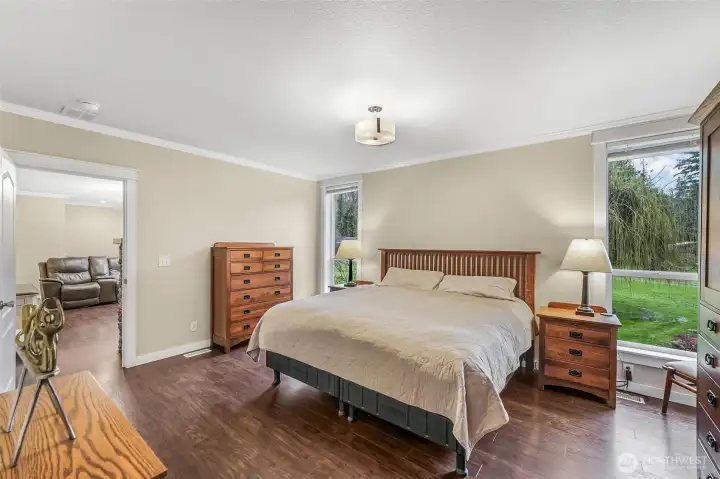 Primary Suite with peaceful and private landscaped view.
