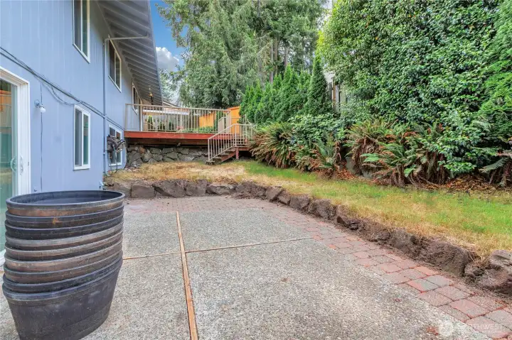 Lower patio with upper deck makes this a fun yard to entertain!