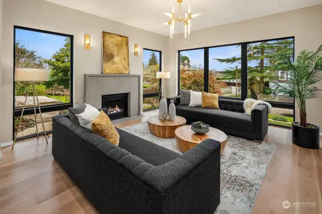 The heart of the home is the open living room that flows into the dining area and epicurean luxe kitchen, all connected with ever-present natural light and consistent aesthetic.