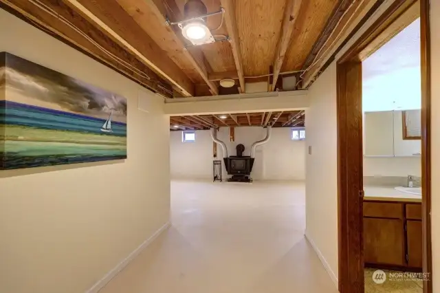 Daylight basement with bonus room and bathroom. The ducted woodstove adds supplemental heat to the entire home.
