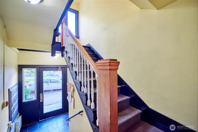 Charming entry leading into first floor unit.