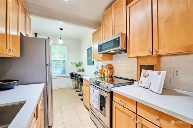 Updated kitchen with added natural light and plenty of eating space.