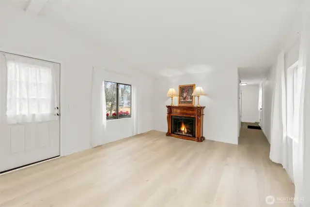 Electric fireplace can stay if desired. Adds a nice warm touch to the space.