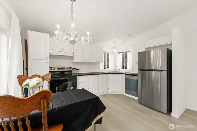 Brand new stainless appliances all stay, reflecting so nicely with the crystal lights!