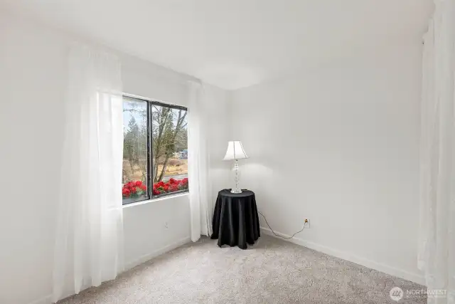 Bedroom 1, bright window, large closet. Could be an office to convert this home to a 1-bedroom unit.