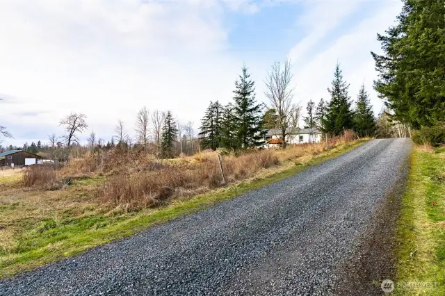 Shared access road that runs through the east side of the property from E Hemmi