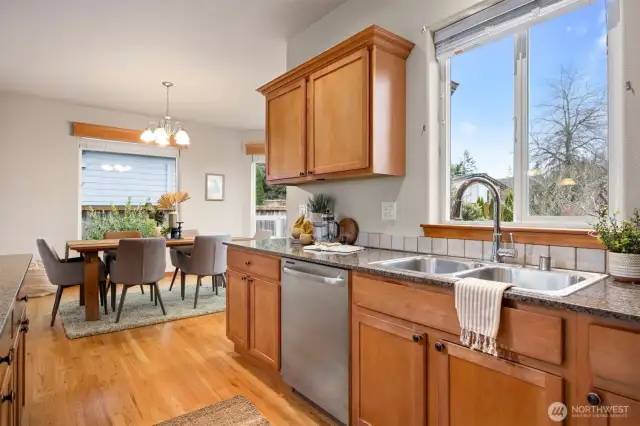 The kitchen and dining open to the large deck off the rear of he home and is the perfect BBQ area.
