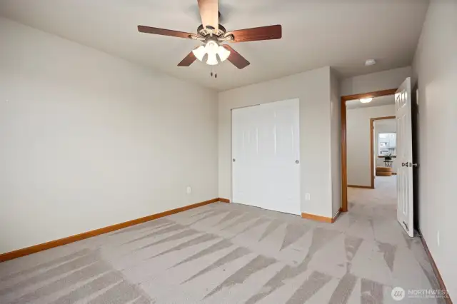 The second bedroom is just at the top of the stair landing and is also quite spacious and faces to the north.