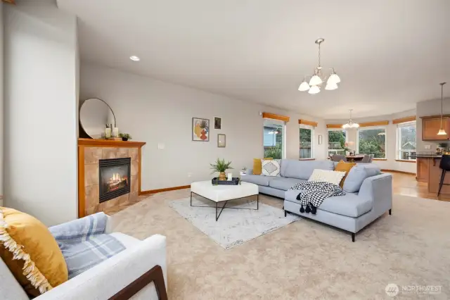 The living room is open to the kitchen and the dining area.