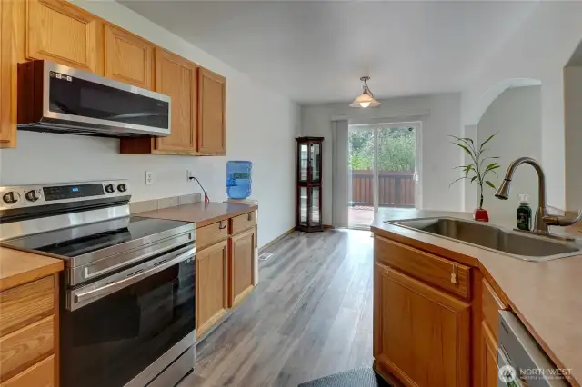 All major appliances stay with home, fridge, range, microwave, dishwasher, and washer and dryer on the upper floor.