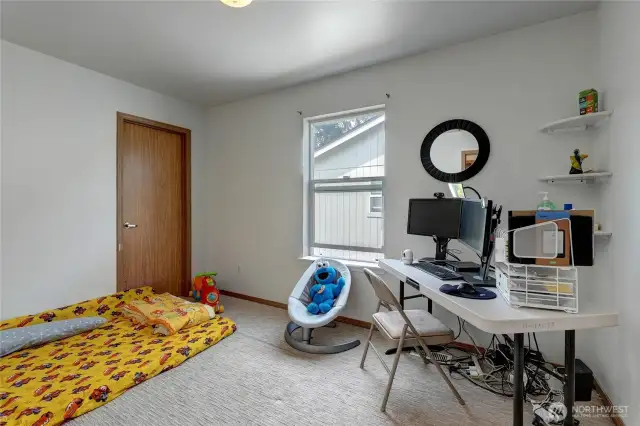 Reverse view of bedroom #2. Walk-in closet at far left.