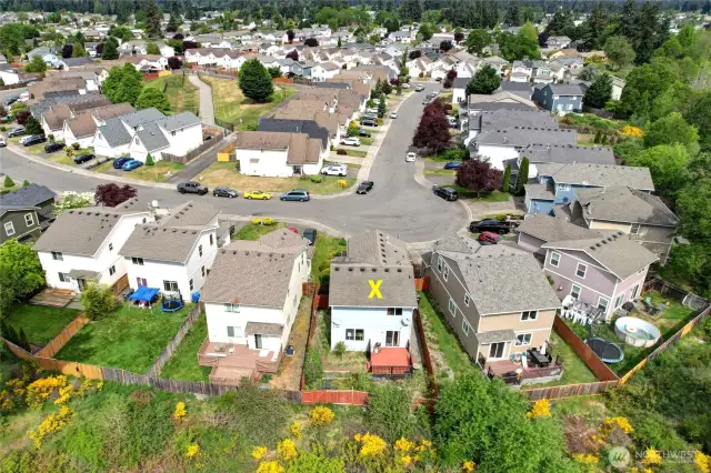 A bit further out. Here you can see that the home is "almost" tucked into a culdesac.