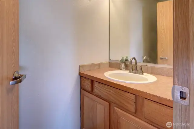 Looking straight ahead, you'll see the guest, half-bath on the main floor.