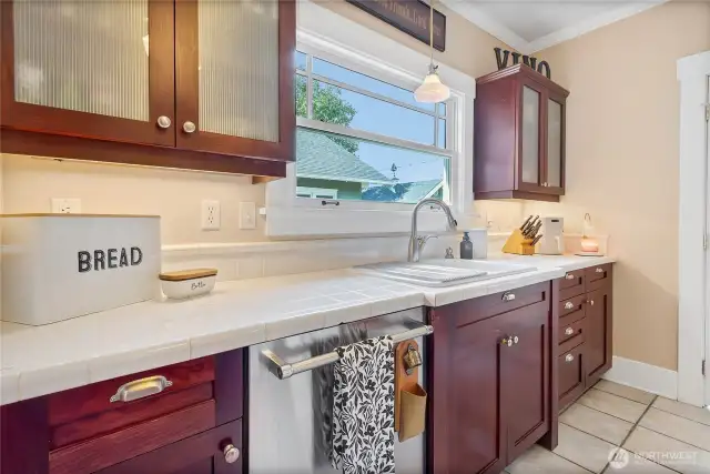 Nice kitchen with window at the sink.