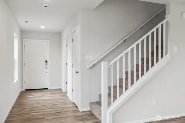 Open concept living/dining/kitchen-Discalimer-Disclaimer- Photos are of another Lina floor plan from a previous community, photos are for illustrative purposes only. Finishes, flooring, upgrades, or other features may vary.