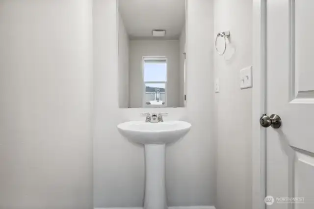 1/2 Bath on Main-Interior Pictures: Disclaimer- Photos are of another Lina floor plan from a previous community, photos are for illustrative purposes only. Finishes, flooring, upgrades, or other features may vary.