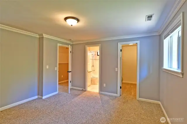 Primary bedroom toward bath and walk-in closet
