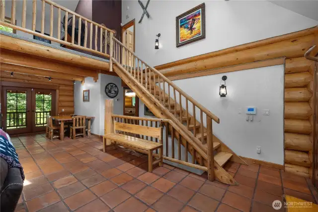 A highlight of this home is a gorgeous wood staircase that beautifully connects all three floors.