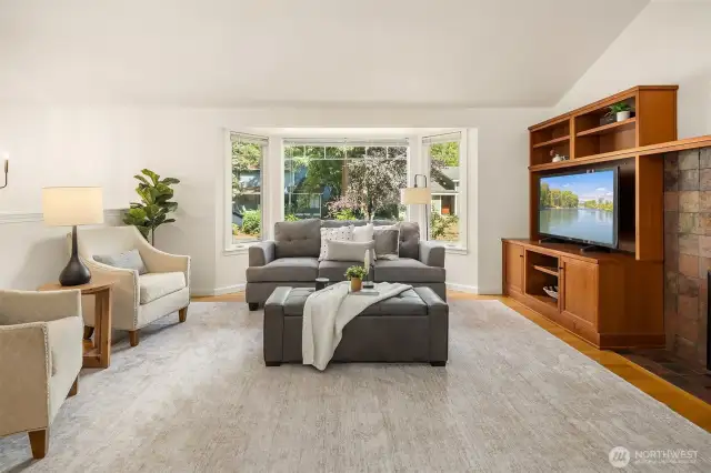 Bay window in living room looks out to the street