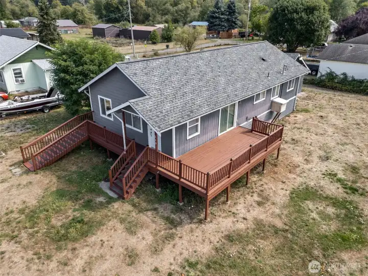 The raised deck is a real asset, giving you outdoor living space right off the house. A few boards could use swapping out, but it’s nothing major, and once freshened up the deck is ready for barbecues, gatherings, or a quiet cup of coffee outside.