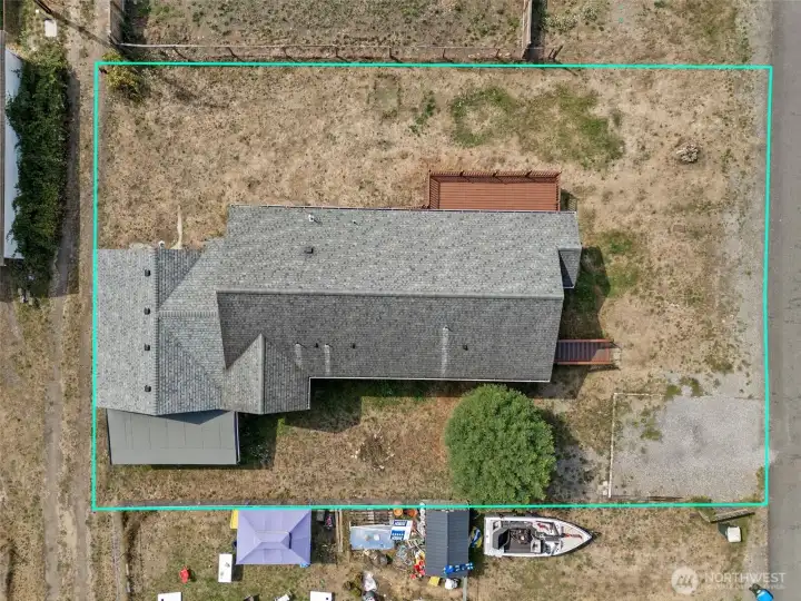 The lot-line view gives you the big picture so you can start sketching your ideas. Fence it for privacy, carve out space for a pool, or keep it open for a firepit and late-night s’mores. It’s level, it’s sunny, and it’s ready for your blueprint.
