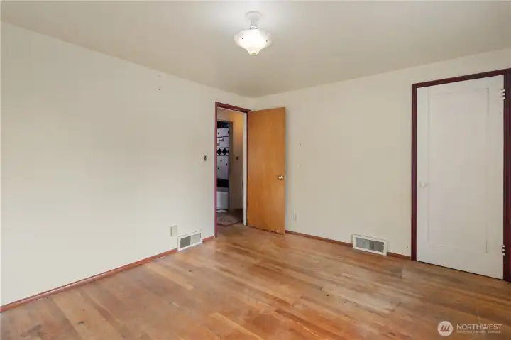 Another view of the bedroom looking out to the hallway.