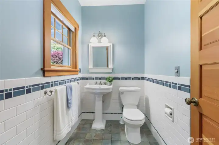 3/4 bath (shower behind door) on the main floor.