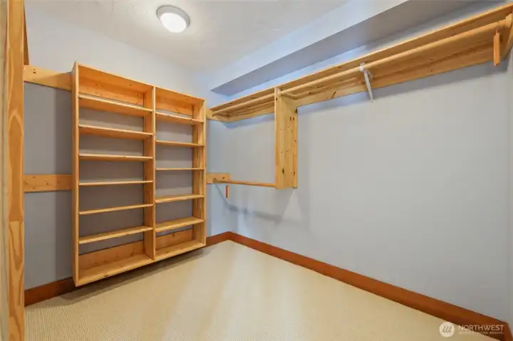 Large primary walk-in closet.