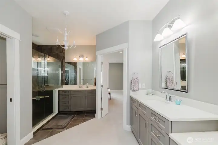 5 piece primary en-suite leads you to generous closet.