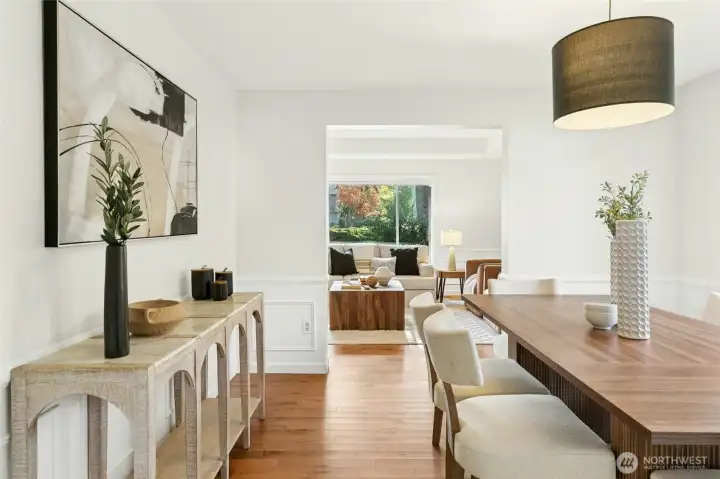 The living and dining rooms flow seamlessly into each other. Perfect for get-togethers and large groups.