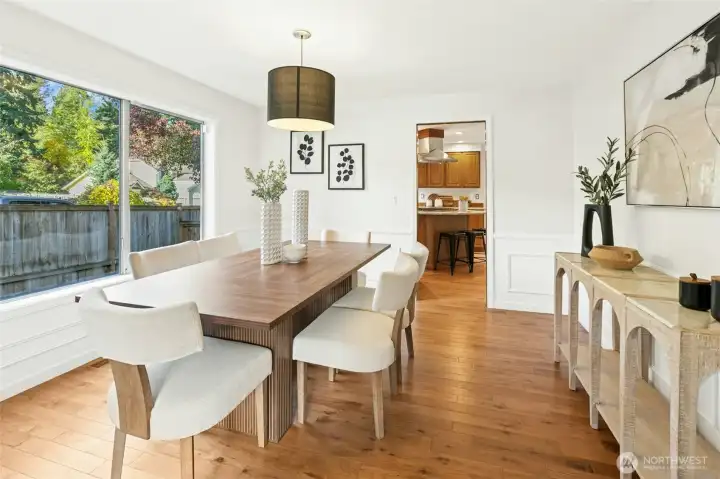 Walk through into the attached kitchen. Host easily, cook, and serve the food hot!