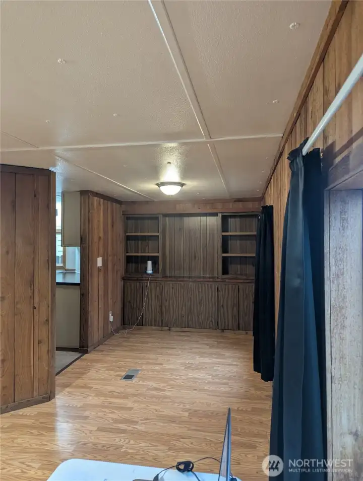 View from the kitchen, this space would be great for dining.