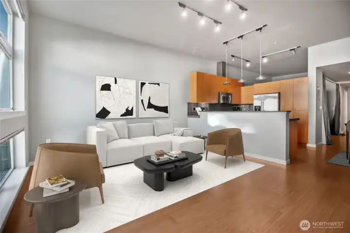 Stylish track and pendant lighting illuminates the space.