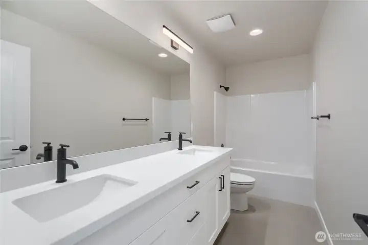 Photos are of another home in the community and are for illustration purposes only to reflect typical finishes.  May depict seller enhancements.  Colors and options may vary.