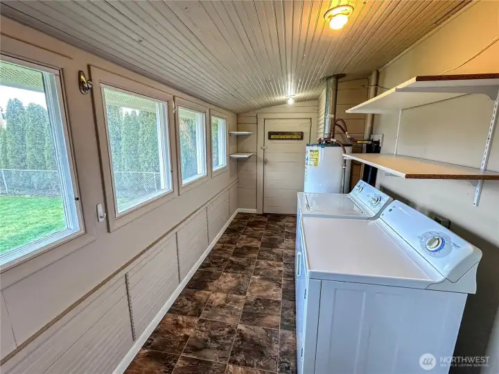 Sunny, dedicated laundry room