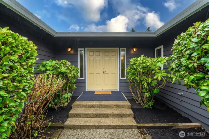 Make your way to the bright double doors to your new home!