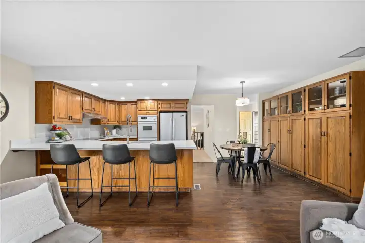 From the dining find yourself in the open open, dining, and living room.