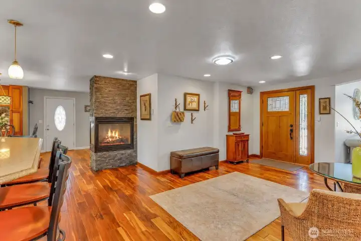 The home is wonderful for entertaining featuring two fireplaces including a cozy dining area corner gas fireplace. The home is wonderful for entertaining featuring two fireplaces including a cozy dining area corner gas fireplace.