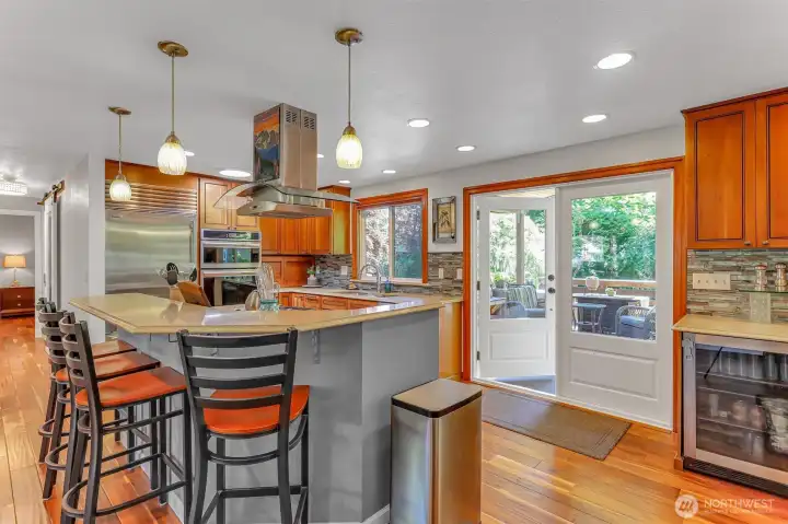 French doors lead to amazing back deck and beautifully designed backyard. French doors lead to amazing back deck and beautifully designed backyard.