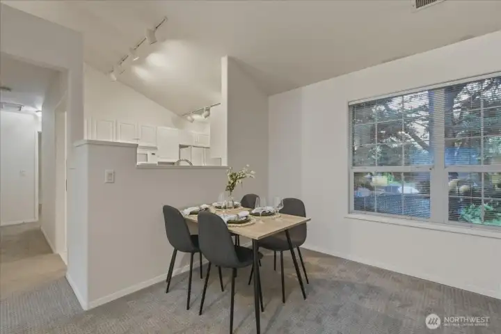 Dining area, vaulted ceilings, w2w carpet