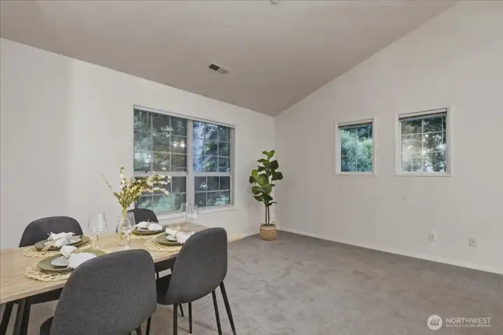 Dining area, vaulted ceilings, w2w carpet, extra living area