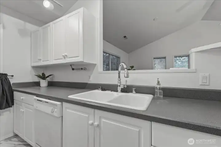 Kitchen, all appliances stay, track lighting, disposal, free-standing range, free-standing fridge